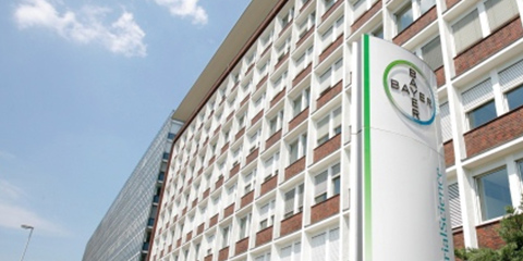 View of the Bayer logo in front of a building.