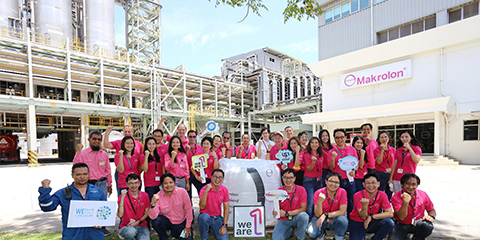 Front view of a Covestro team celebrating ISCC certification.