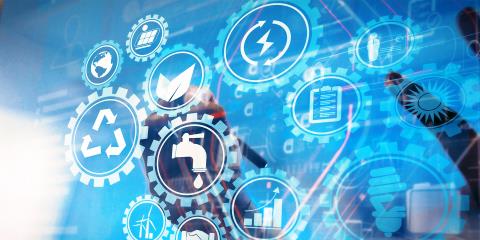 Different sustainability symbols on a screen